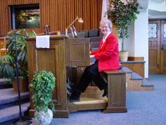 June at the organ at Temple